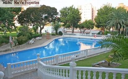 Swimming pool of Flat for sale in Benidorm  with Air Conditioner, Private garden and Community pool