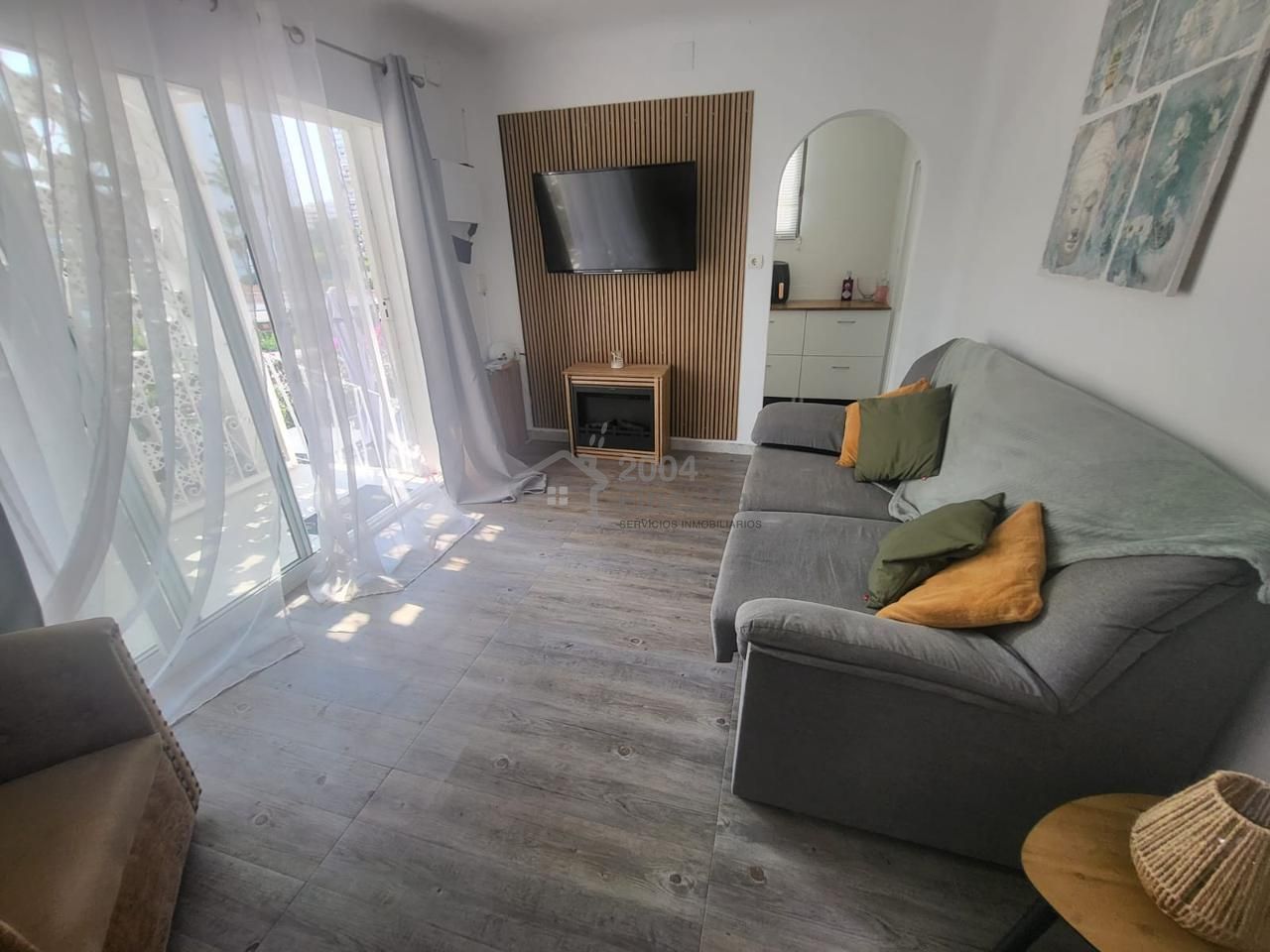Sala d'estar de Pis en venda en Finestrat amb Aire condicionat, Terrassa i Moblat
