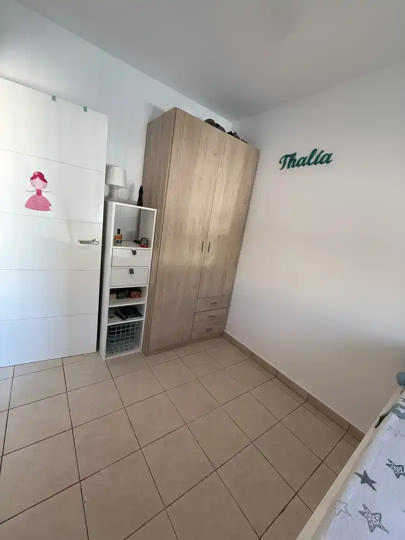 Dormitori de Apartament de lloguer en El Verger amb Aire condicionat, Jardí privat i Piscina