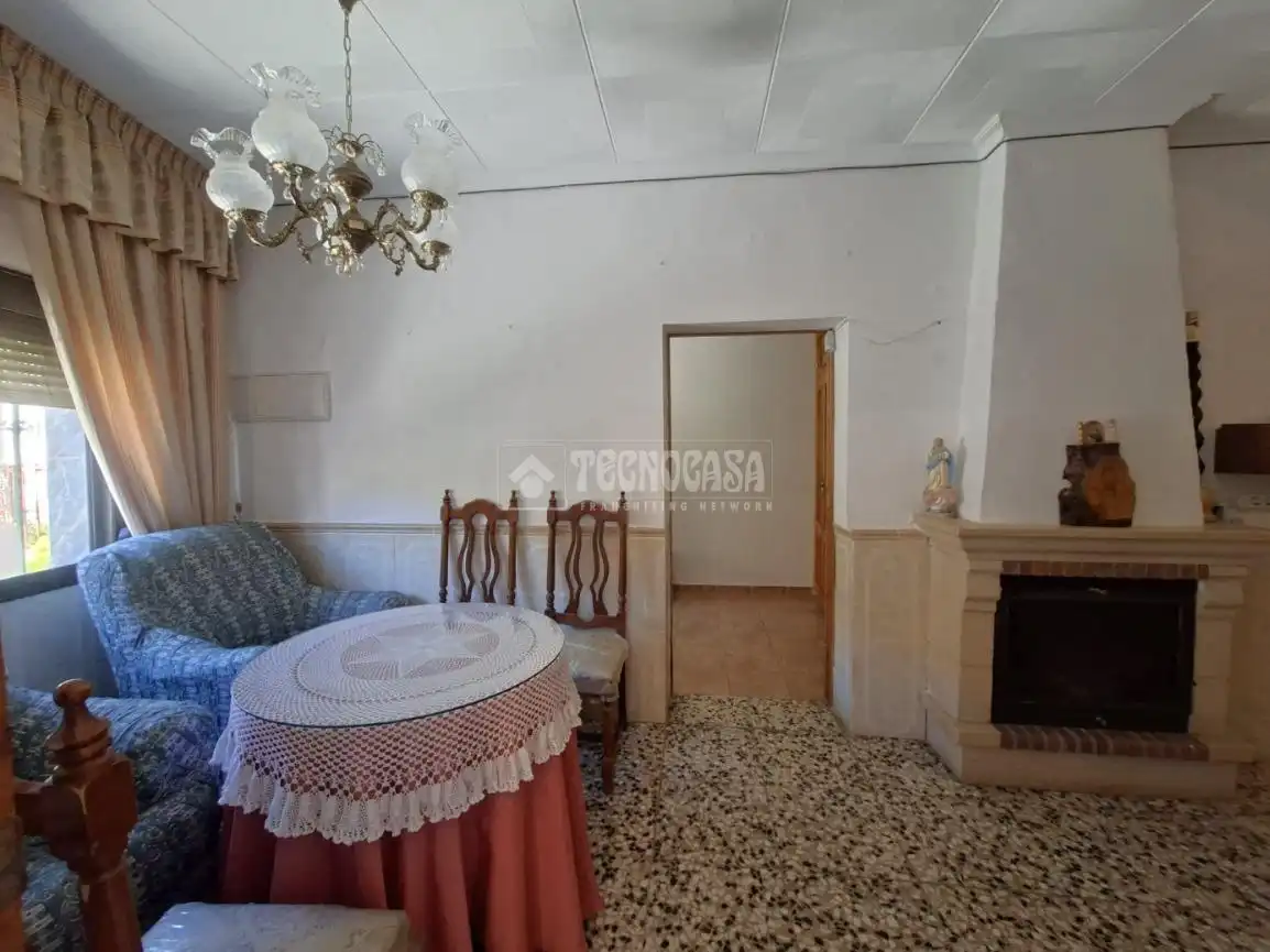 Sala d'estar de Casa adosada en venda en Valle del Zalabí amb Calefacció i Terrassa