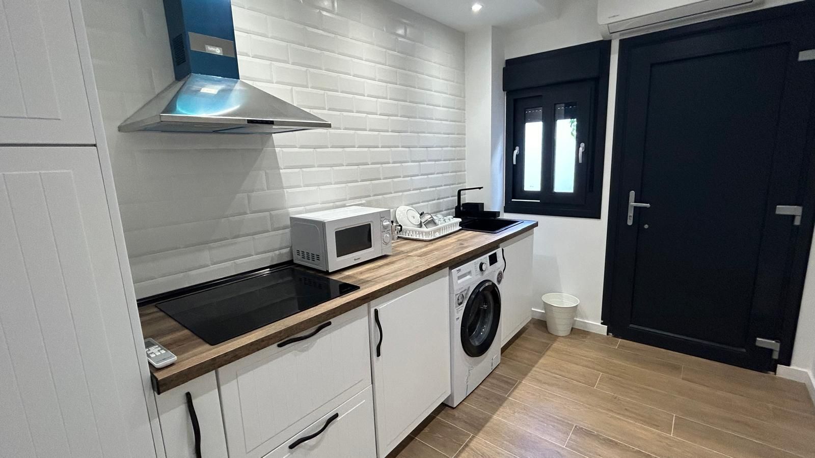 Kitchen of Apartment to rent in Algeciras  with Air Conditioner and Furnished