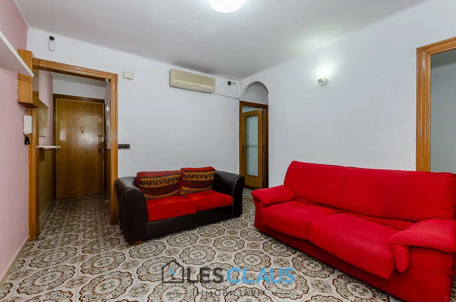 Sala d'estar de Pis en venda en Esplugues de Llobregat amb Aire condicionat i Moblat