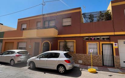 Exterior view of Single-family semi-detached for sale in Roquetas de Mar  with Air Conditioner, Heating and Terrace