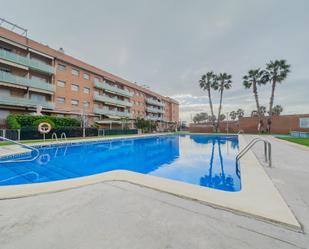 Swimming pool of Planta baja for sale in Cubelles  with Air Conditioner, Heating and Private garden