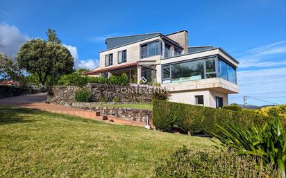 Exterior view of House or chalet for sale in Pontevedra Capital   with Air Conditioner, Heating and Private garden