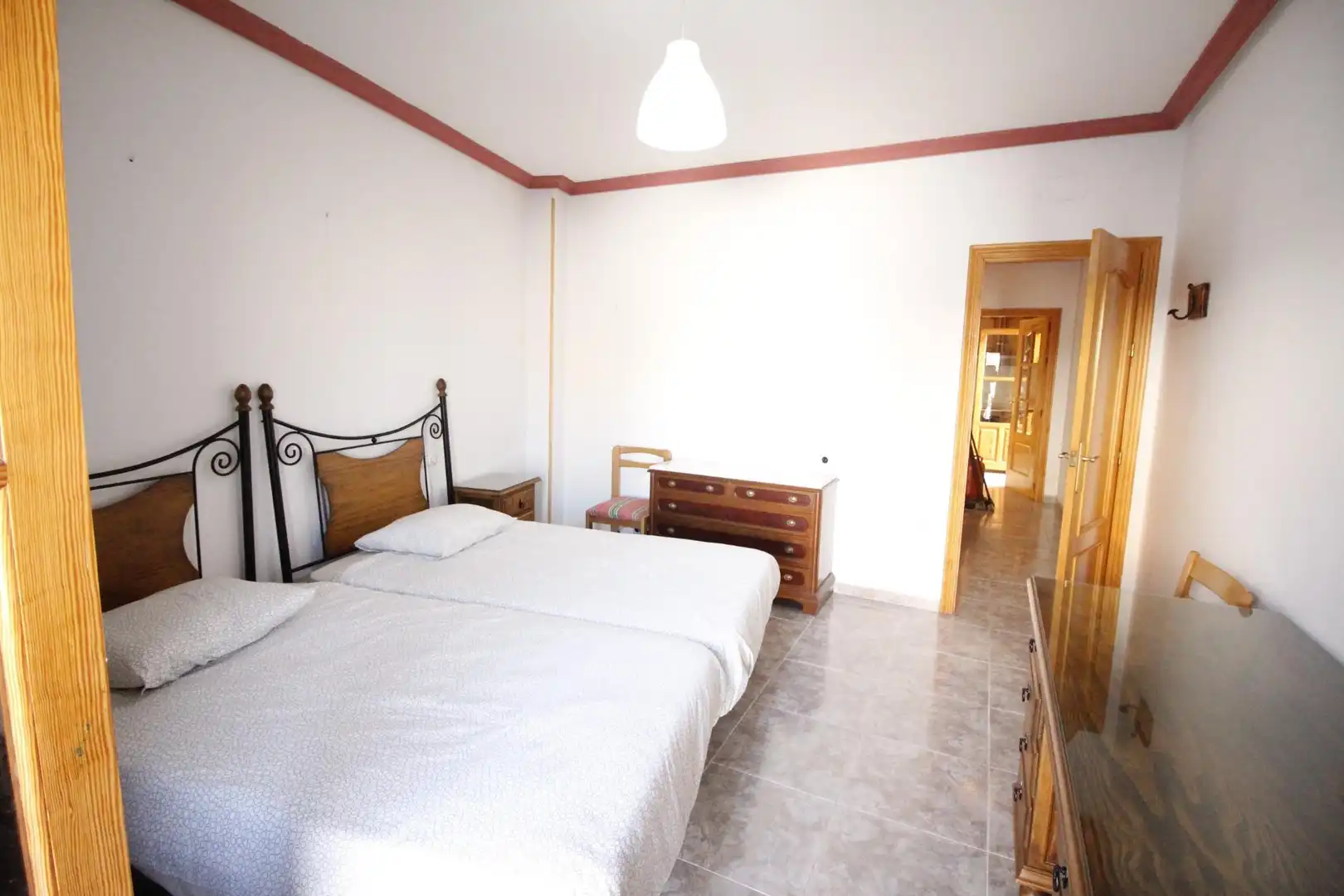 Dormitori de Casa o xalet en venda en Baza amb Calefacció i Balcó