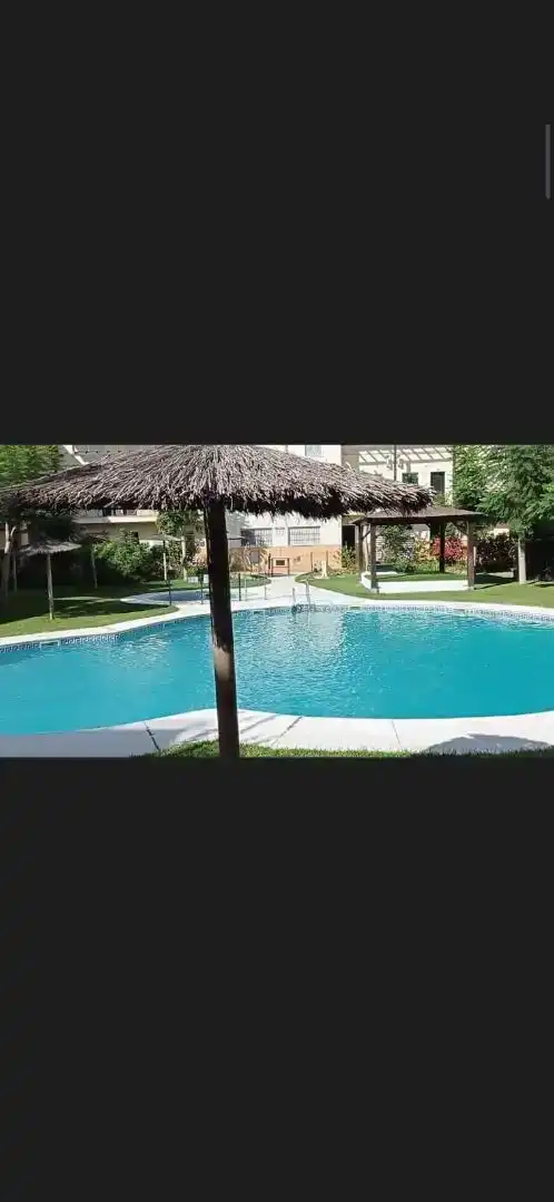 Piscina de Pis de lloguer en Chipiona amb Jardí privat, Piscina i Moblat
