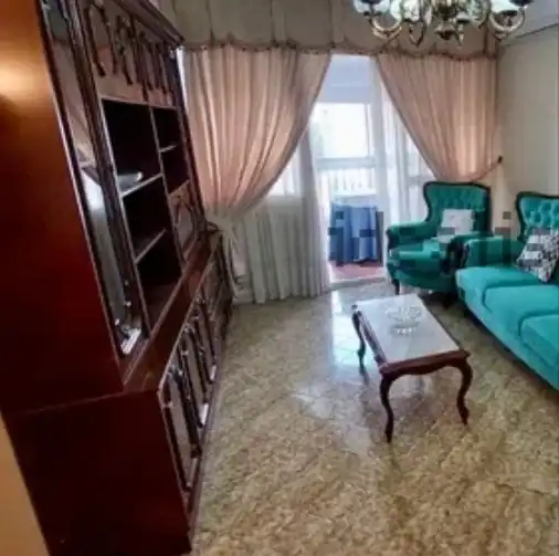 Sala de estar de Piso en venta en Sevilla con Aire acondicionado, Terraza y Amueblado
