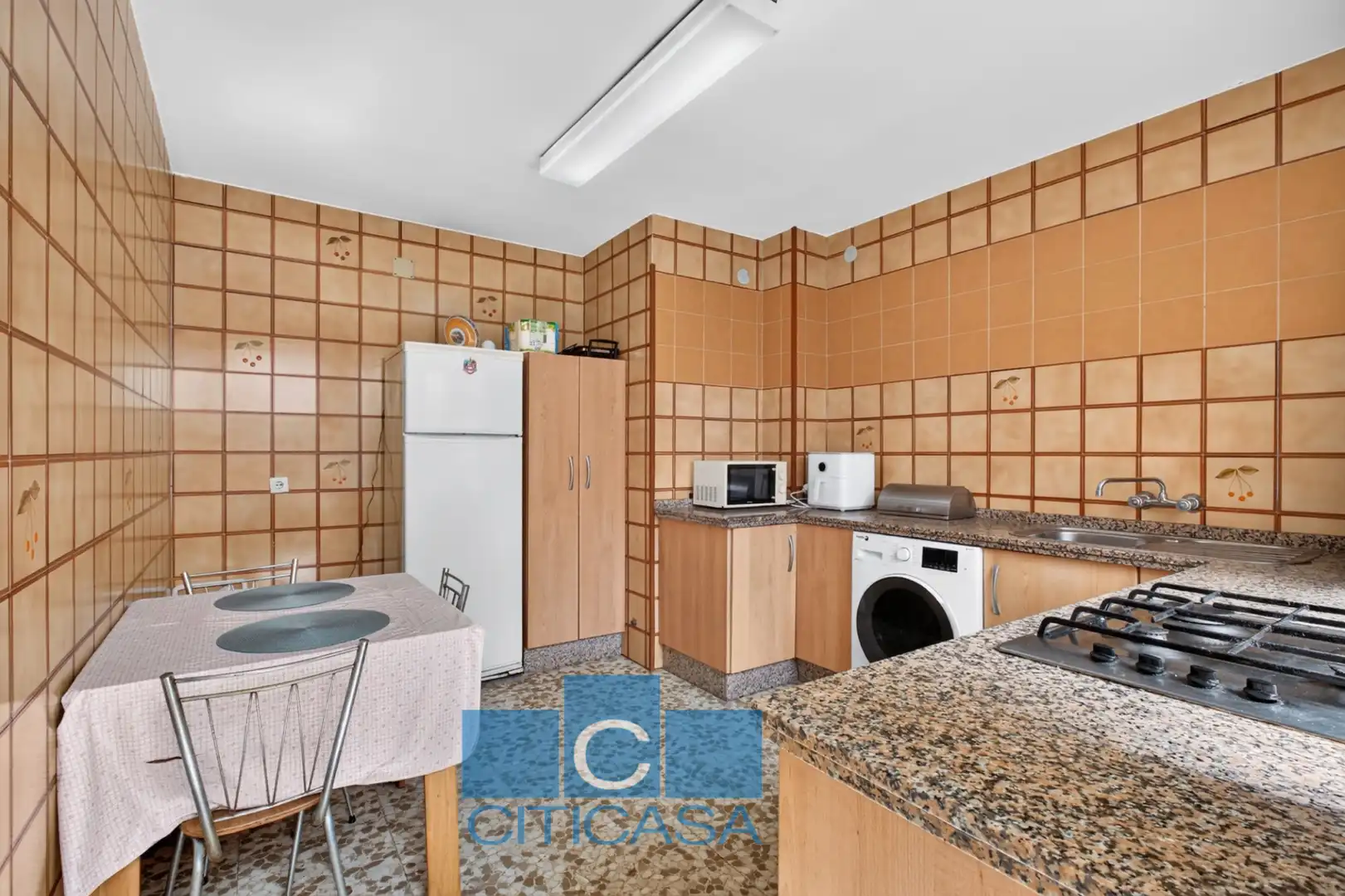 Cuina de Casa o xalet en venda en Málaga amb Terrassa i Balcó