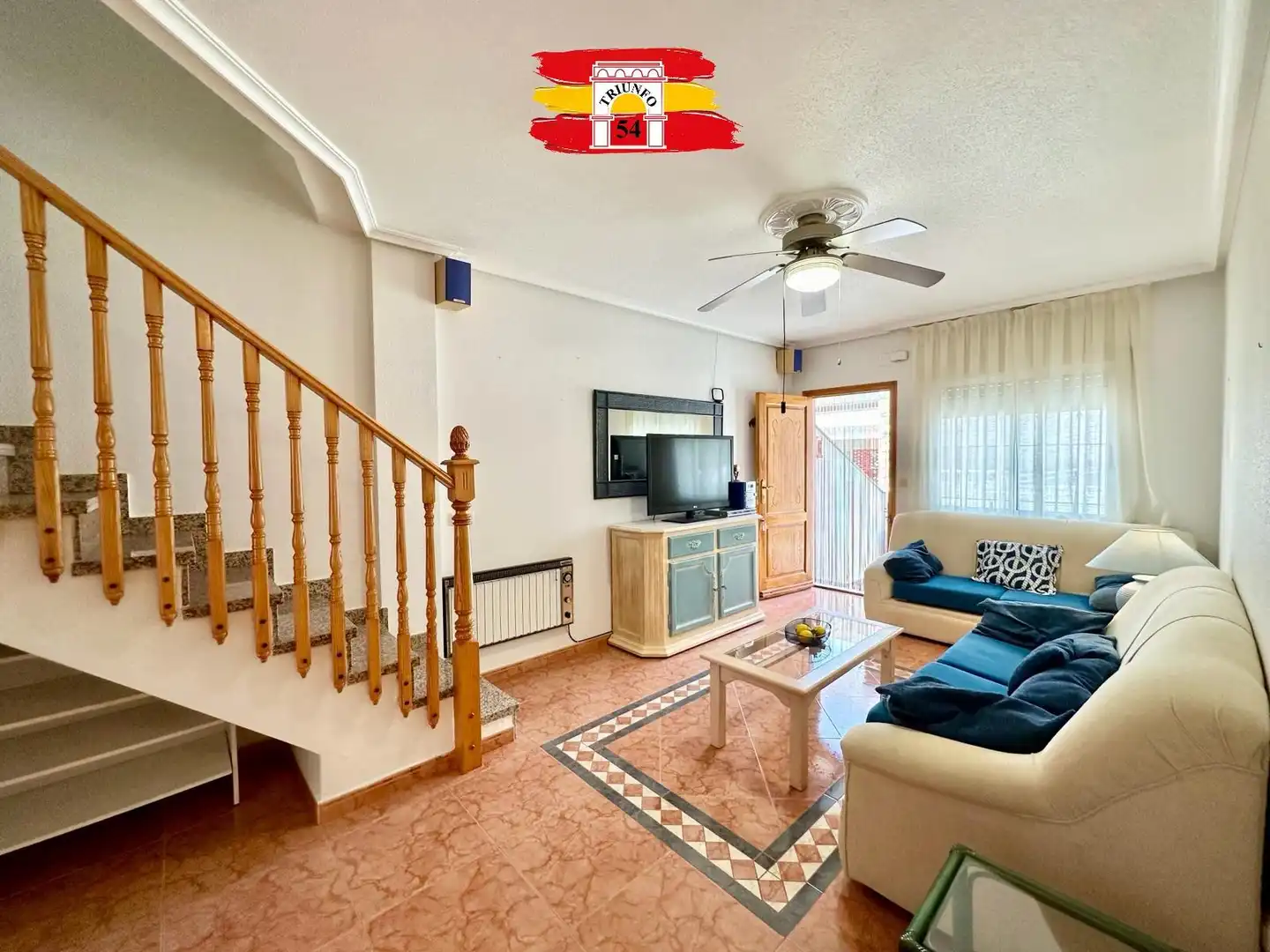 Sala de estar de Casa adosada en venta en Pilar de la Horadada con Aire acondicionado, Terraza y Amueblado