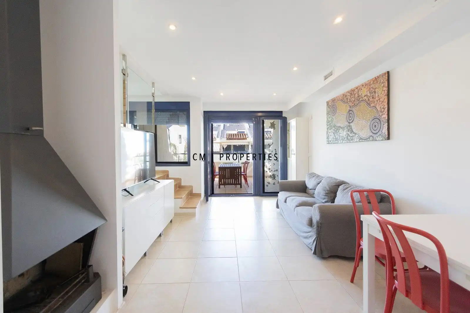 Sala d'estar de Casa adosada en venda en Sagunto / Sagunt amb Aire condicionat, Calefacció i Terrassa