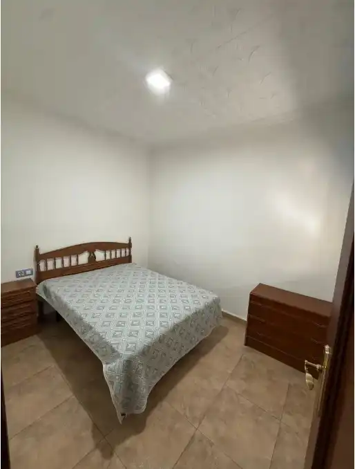 Habitación de Casa adosada en venta en Puertollano con Aire acondicionado, Calefacción y Amueblado