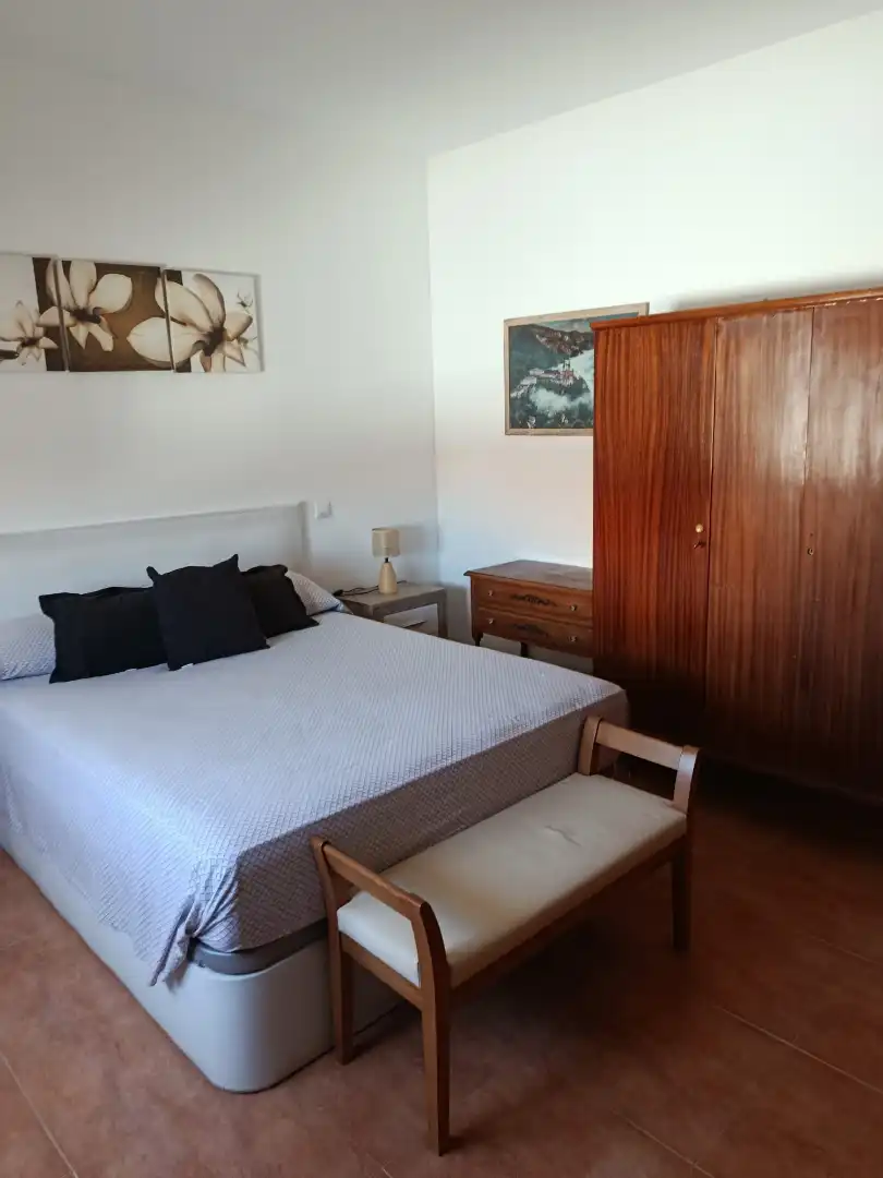 Dormitori de Casa adosada en venda en Mota del Cuervo amb Calefacció, Terrassa i Moblat