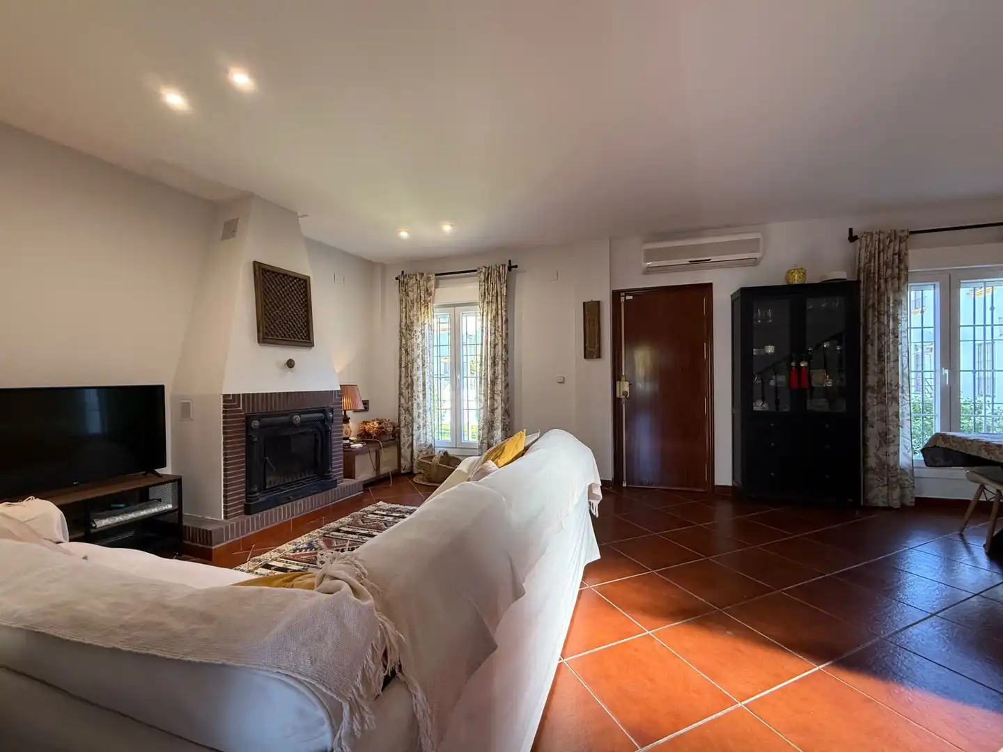 Sala de estar de Casa adosada de alquiler en Aljaraque con Piscina comunitaria