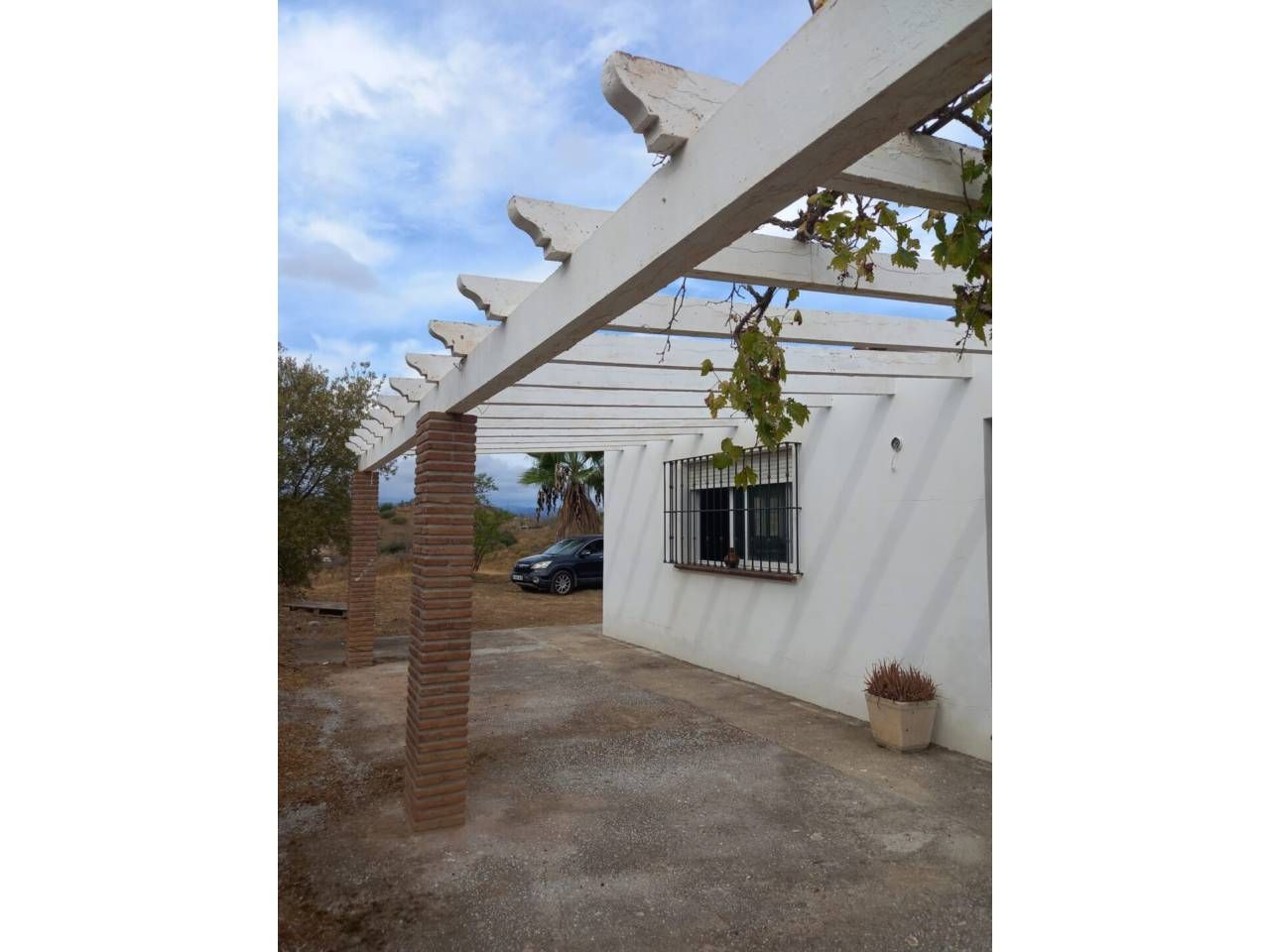 Vista exterior de Casa o xalet en venda en Canillas de Aceituno amb Jardí privat i Moblat