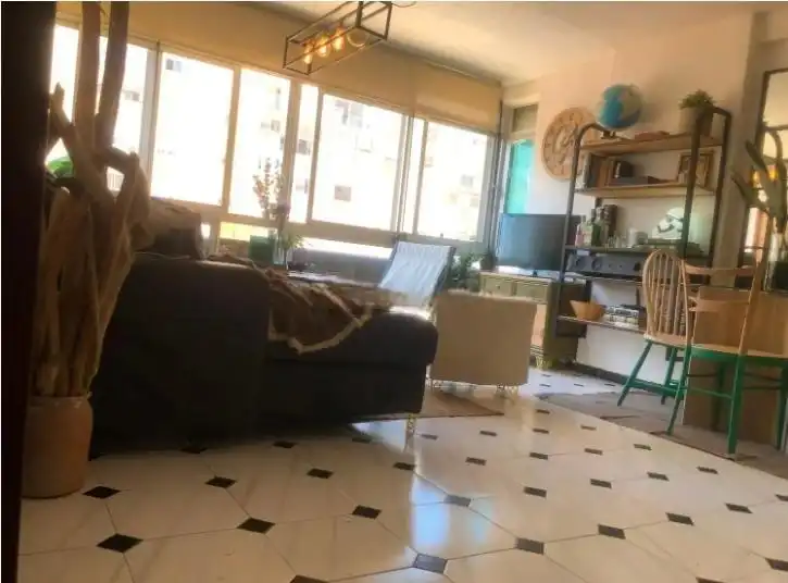 Sala d'estar de Pis per a compartir en Málaga amb Moblat, Rentadora i TV