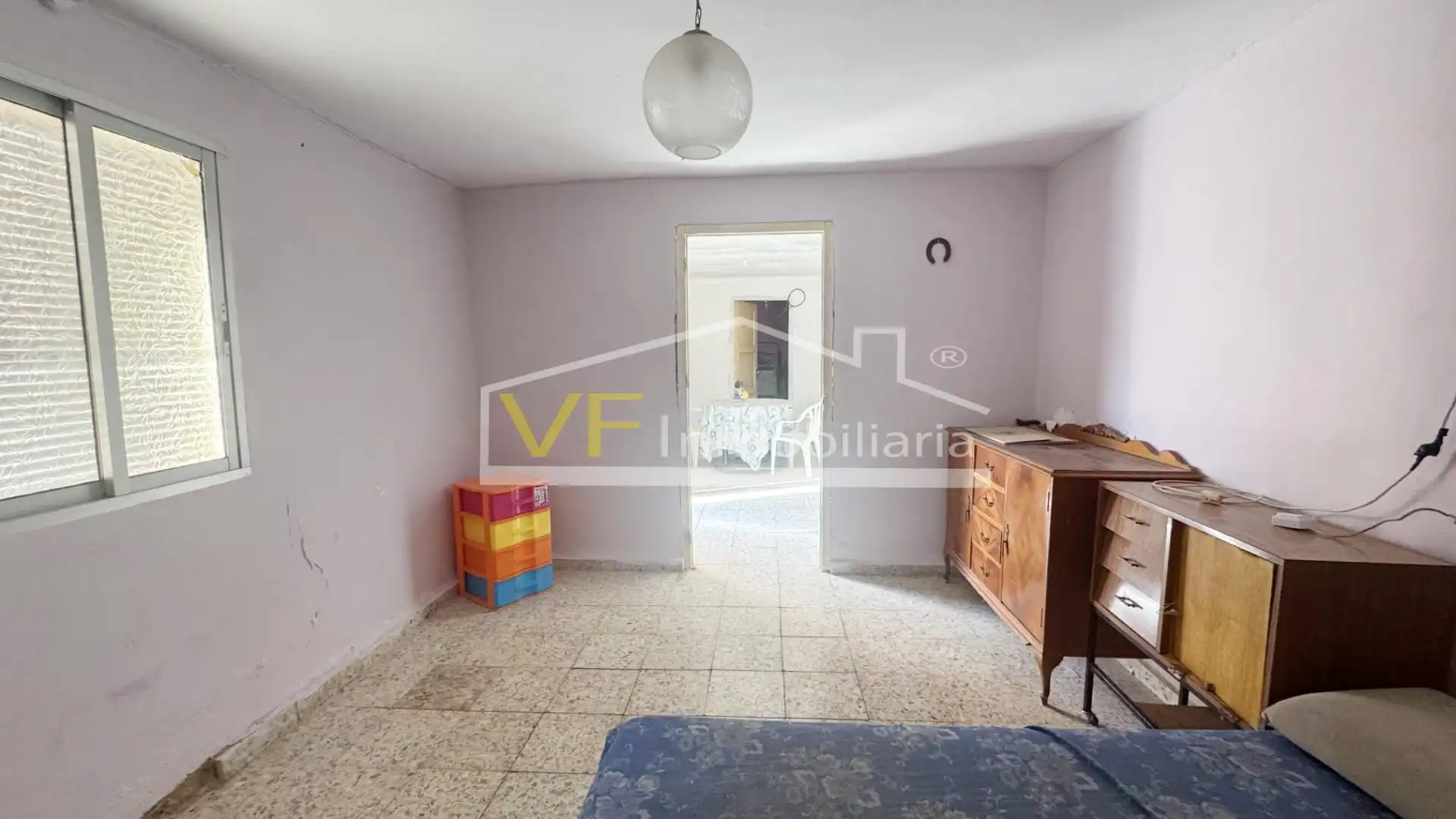 Sala d'estar de Casa adosada en venda en Colmenar