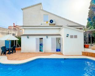 Swimming pool of House or chalet for sale in Calafell  with Air Conditioner, Heating and Private garden