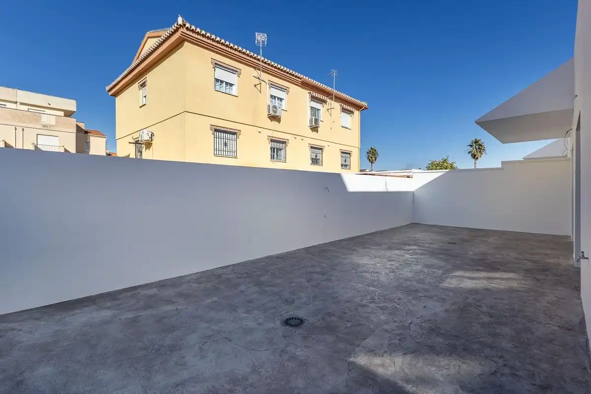 Vista exterior de Casa adosada en venta en Vegas del Genil con Aire acondicionado, Calefacción y Jardín privado