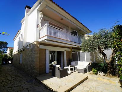 Exterior view of Single-family semi-detached for sale in El Vendrell  with Air Conditioner and Terrace