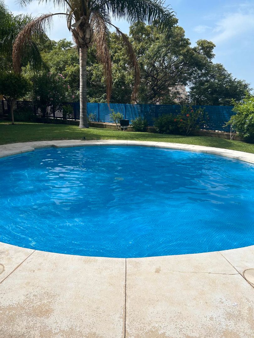 Swimming pool of Flat for sale in Benalmádena  with Air Conditioner, Terrace and Storage room