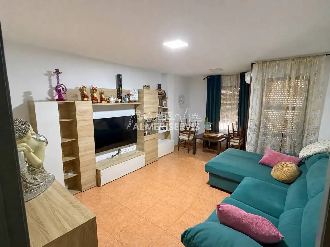 Sala d'estar de Casa adosada en venda en El Ejido amb Aire condicionat, Terrassa i Moblat