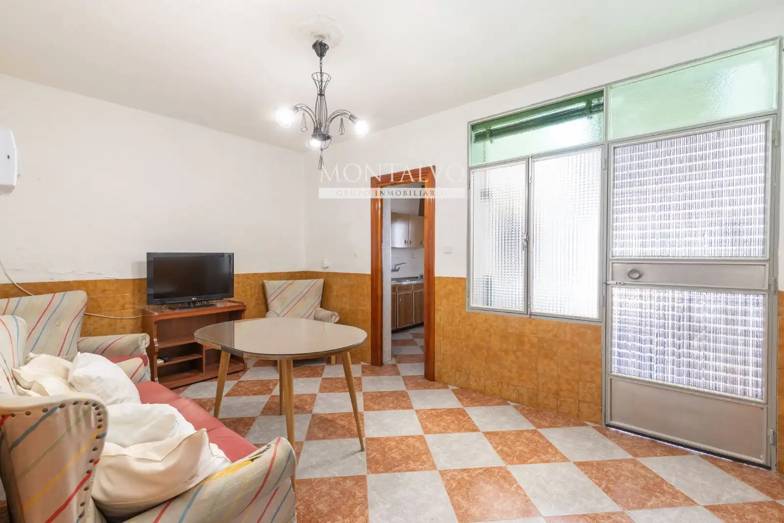 Sala d'estar de Casa adosada en venda en Atarfe