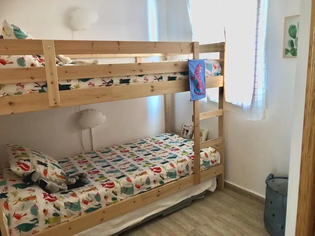 Dormitori de Apartament de lloguer en La Manga del Mar Menor amb Aire condicionat, Calefacció i Piscina