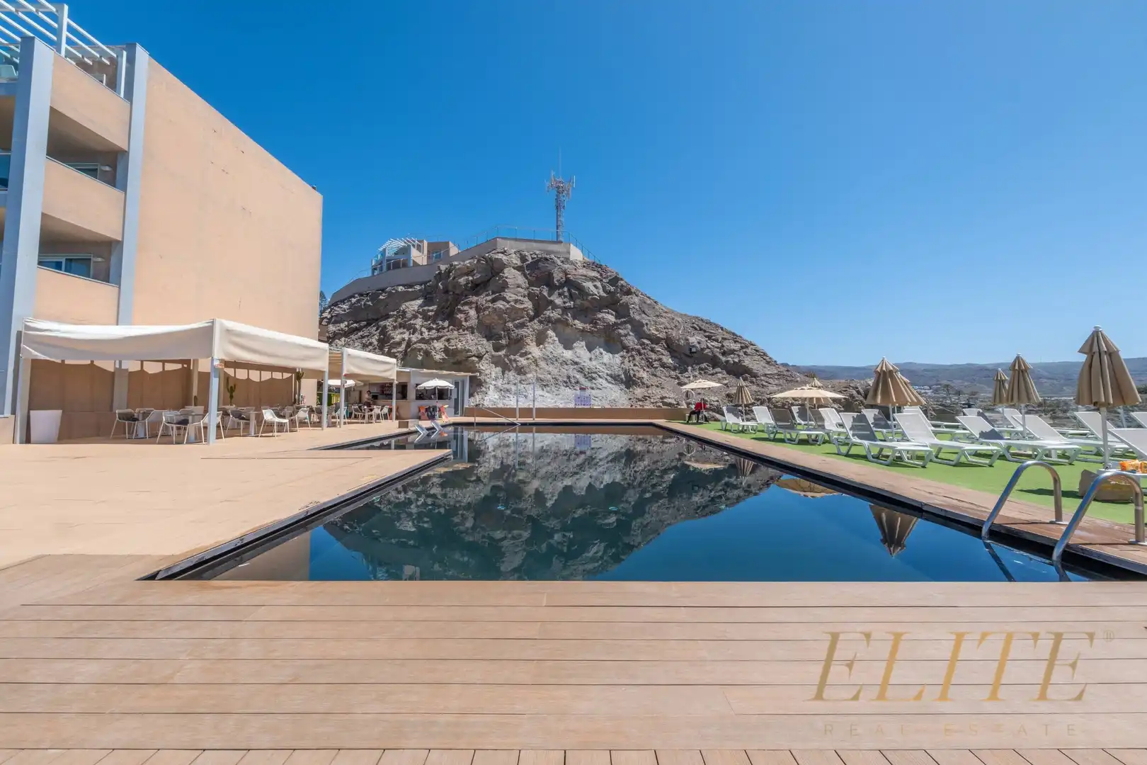 Schwimmbecken von Wohnungen zum Verkauf in Mogán mit Klimaanlage, Privatgarten und Terrasse