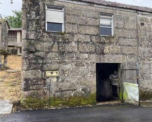 Vista exterior de Casa adosada en venda en Crecente amb Jardí privat