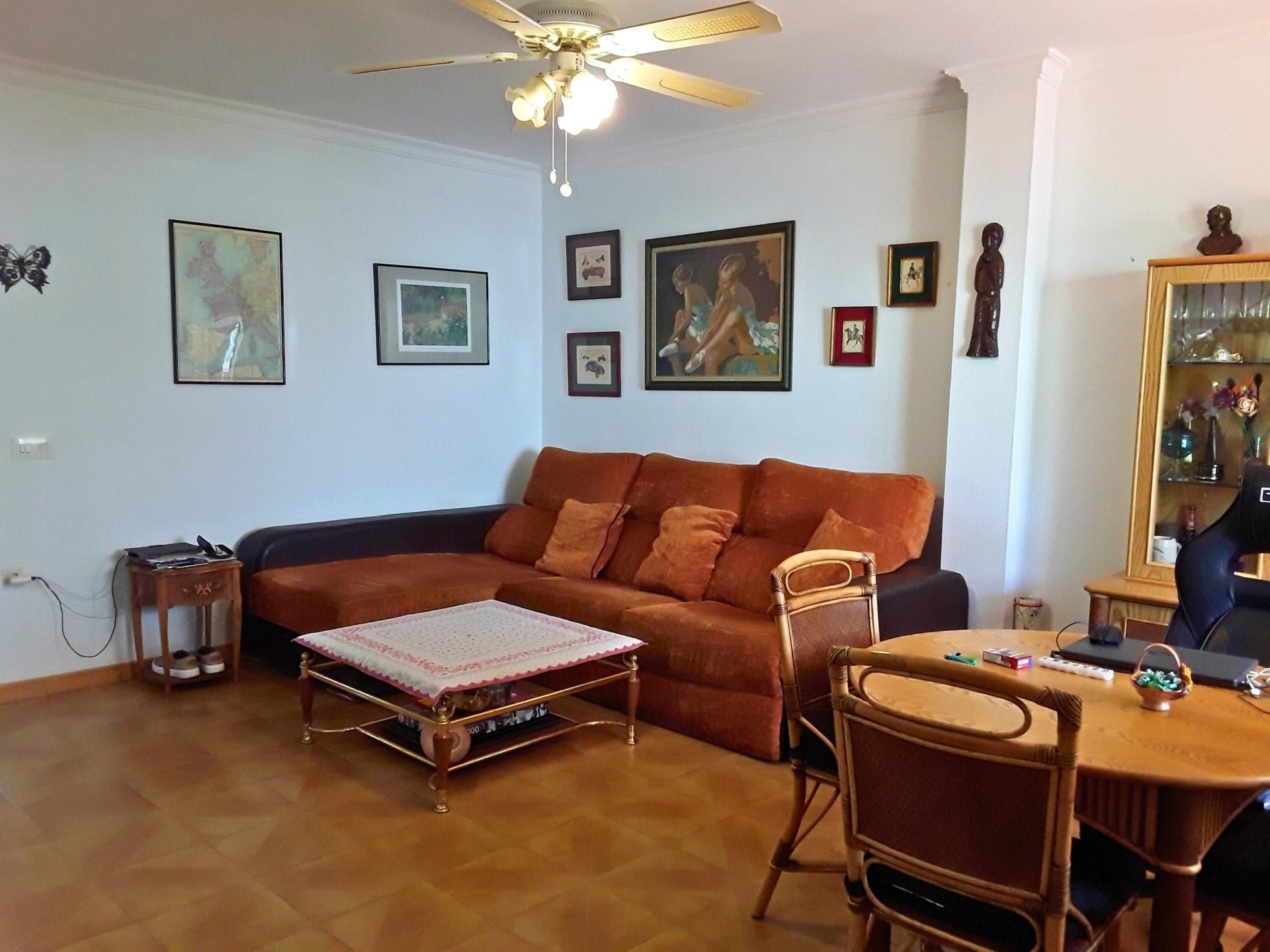 Sala de estar de Casa adosada en venta en Chipiona con Terraza y Balcón