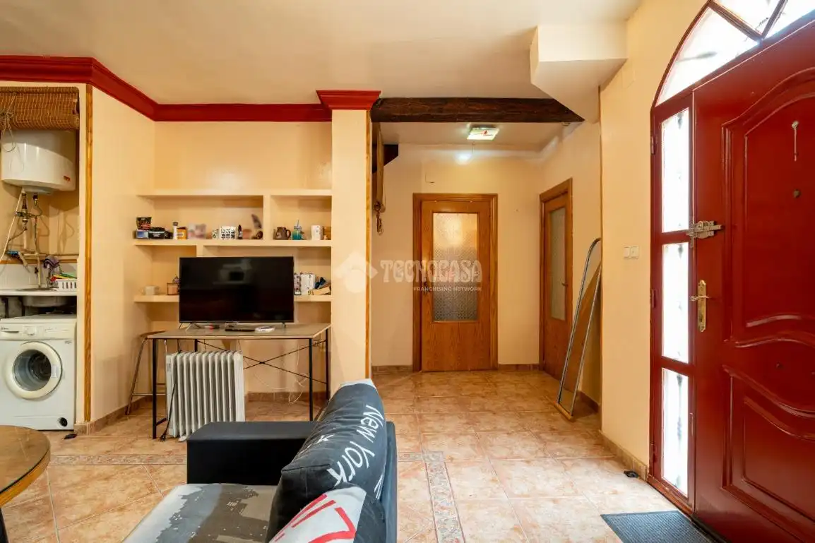 Sala de estar de Casa adosada en venta en Granada con Aire acondicionado