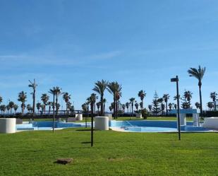 Swimming pool of Attic for sale in Roquetas de Mar  with Air Conditioner, Heating and Parquet flooring