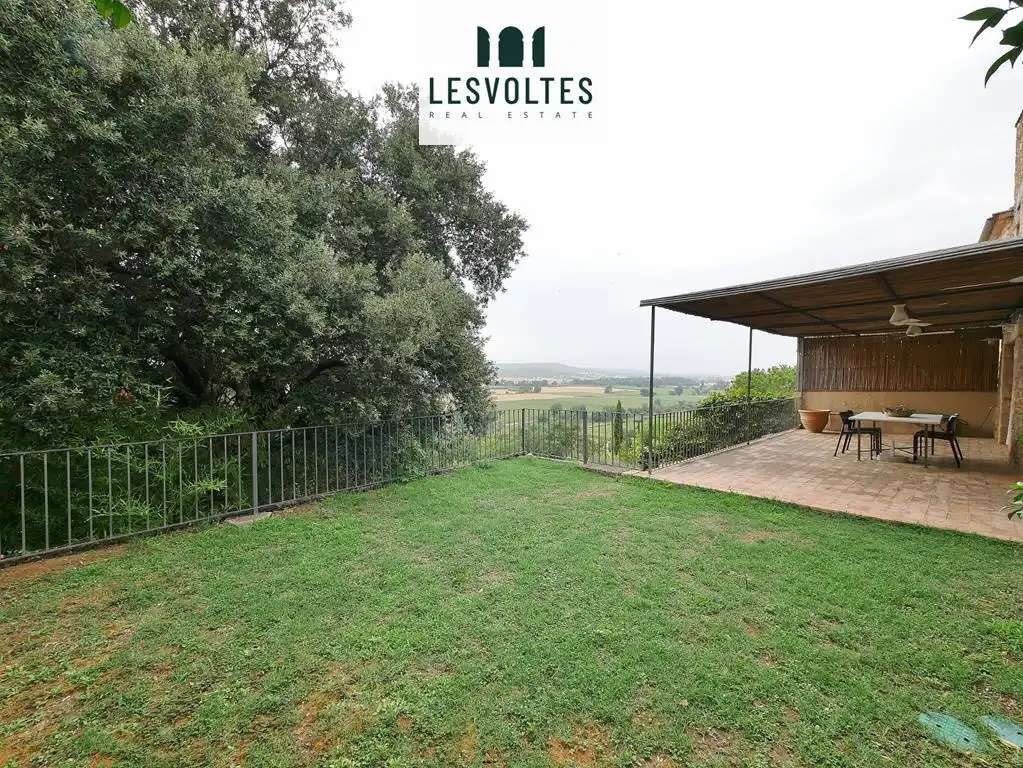 Vista exterior de Finca rústica en venda en La Bisbal d'Empordà amb Aire condicionat, Calefacció i Jardí privat