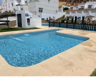 Swimming pool of Duplex for sale in Roquetas de Mar  with Air Conditioner, Storage room and Furnished
