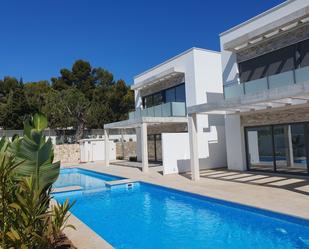 Swimming pool of Single-family semi-detached for sale in Moraira  with Air Conditioner, Terrace and Storage room