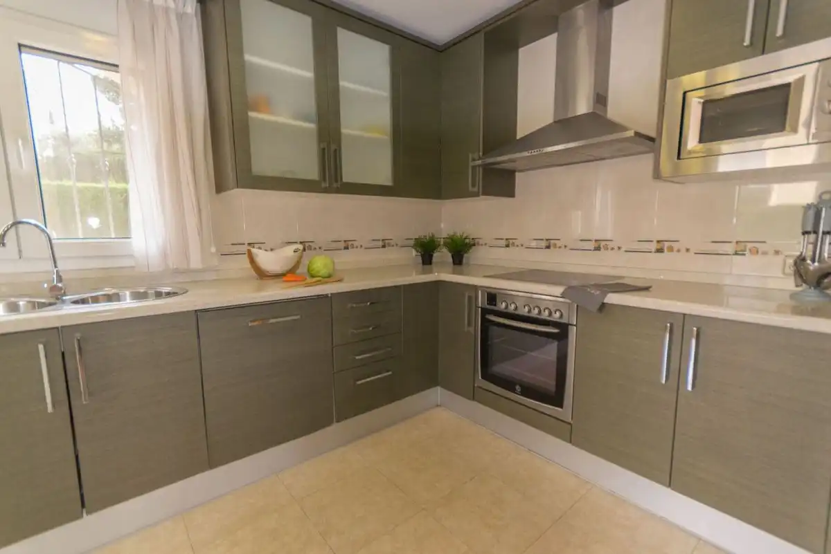 Cocina de Casa o chalet en venta en L'Ampolla con Aire acondicionado, Jardín privado y Terraza