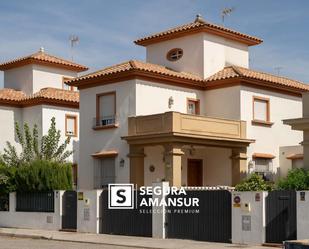 Exterior view of House or chalet for sale in  Huelva Capital  with Air Conditioner, Terrace and Swimming Pool