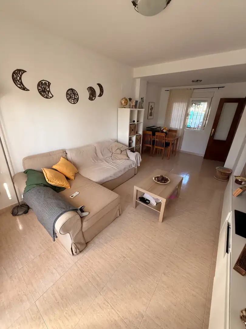 Sala de estar de Casa adosada en venta en Carrión de los Céspedes con Terraza