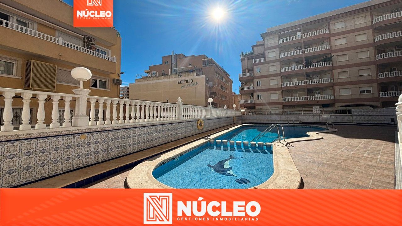 Swimming pool of Flat for sale in Torrevieja  with Air Conditioner, Terrace and Furnished