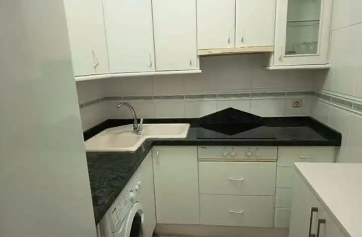 Kitchen of Flat for sale in Almería  with Community pool