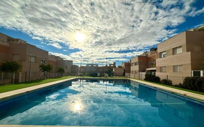 Swimming pool of Duplex for sale in  Almería Capital  with Air Conditioner, Terrace and Balcony