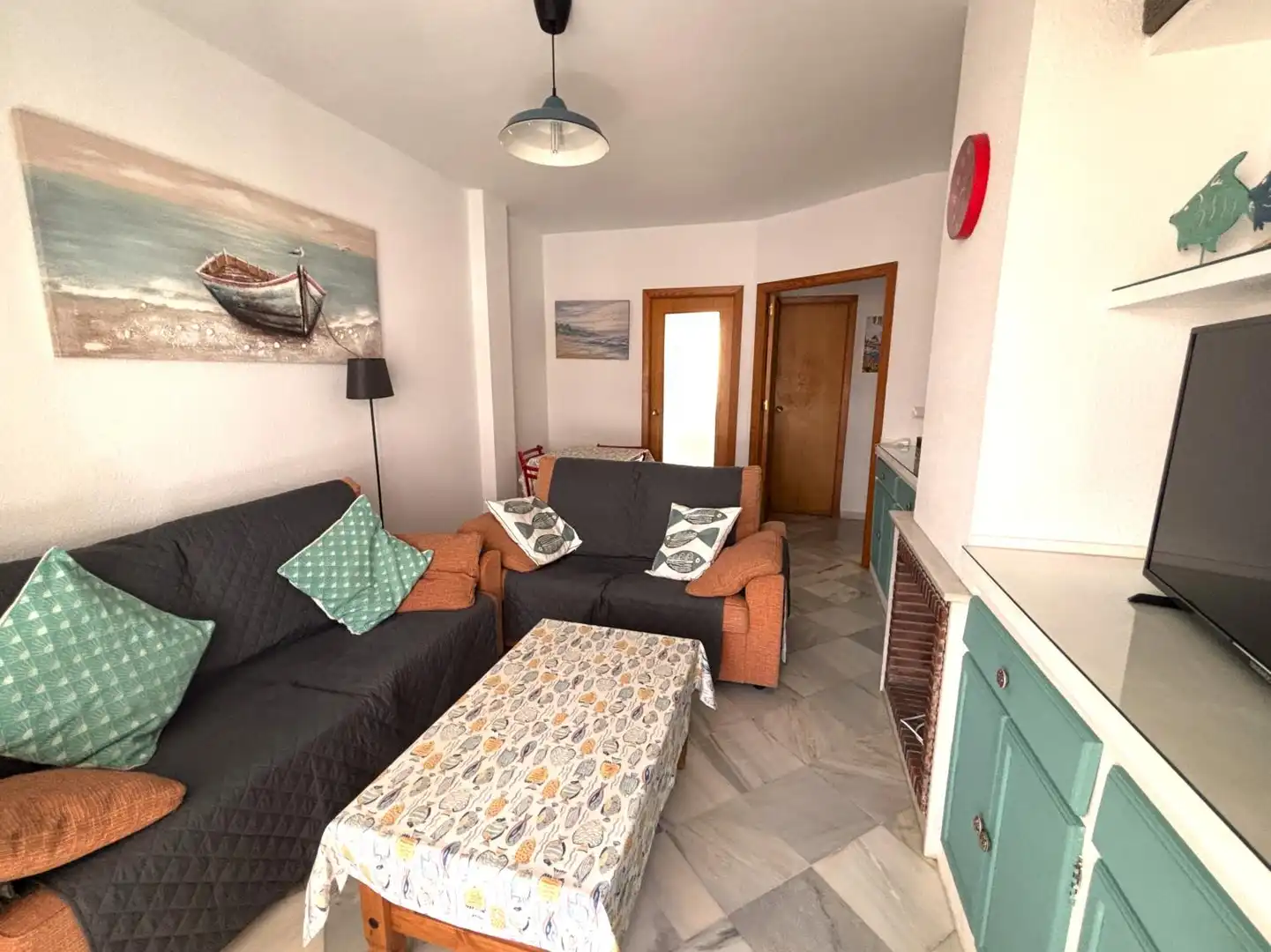 Sala de estar de Piso en venta en El Portil con Calefacción, Terraza y Piscina