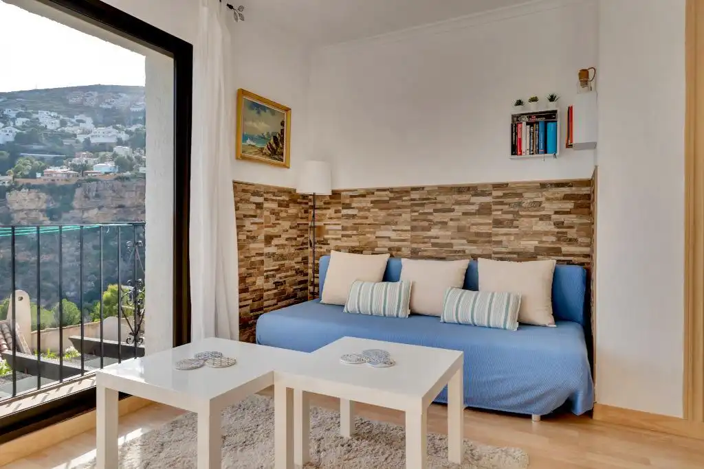 Sala d'estar de Apartament en venda en Benitachell / El Poble Nou de Benitatxell amb Aire condicionat, Terrassa i Piscina