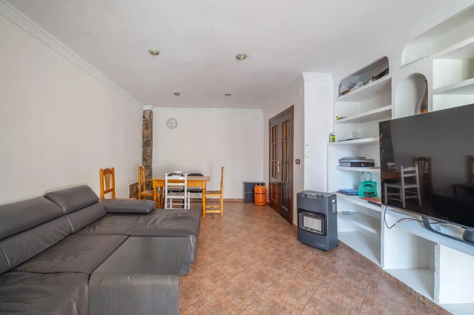 Sala d'estar de Casa o xalet en venda en Las Gabias amb Aire condicionat i Balcó