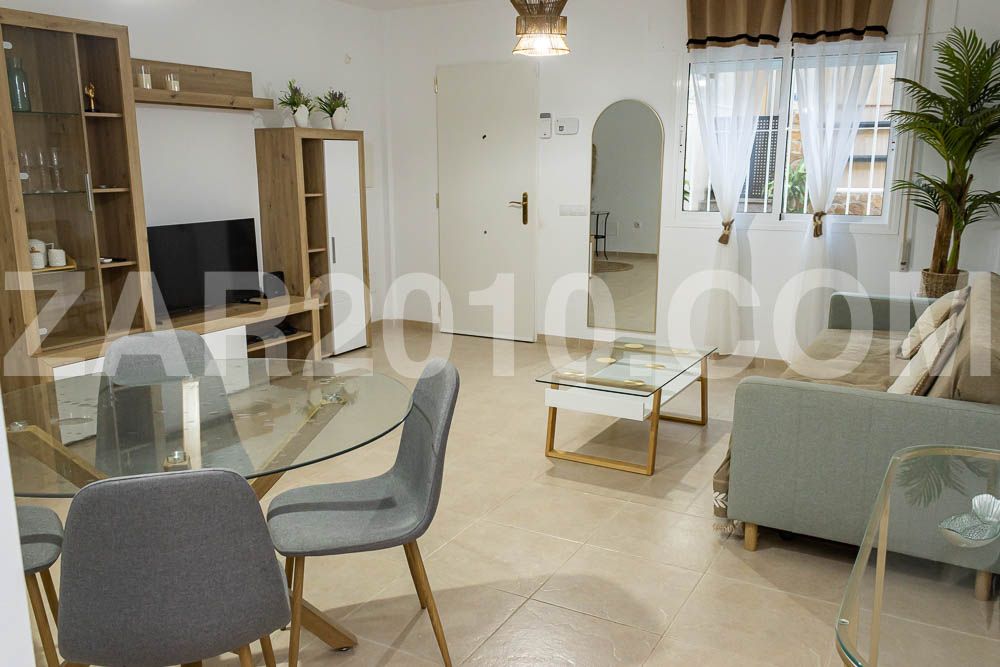 Sala d'estar de Apartament en venda en Cuevas del Almanzora amb Aire condicionat, Traster i Moblat