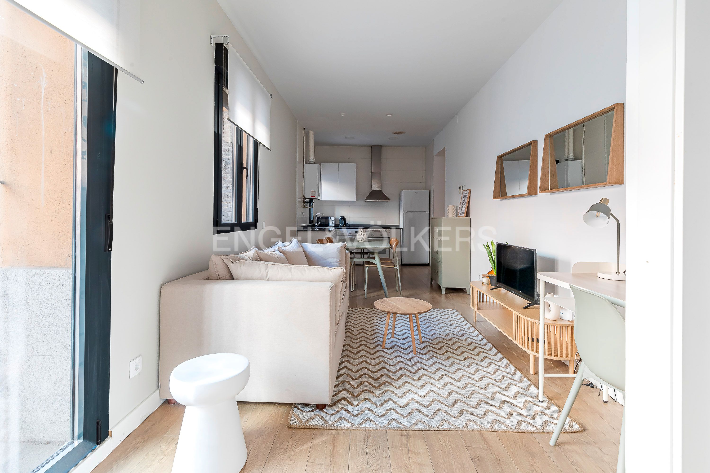 Sala d'estar de Apartament de lloguer en  Madrid Capital amb Aire condicionat, Calefacció i Moblat