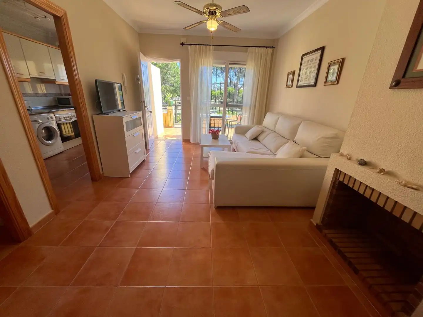 Sala de estar de Casa adosada en venta en Islantilla con Aire acondicionado, Terraza y Piscina