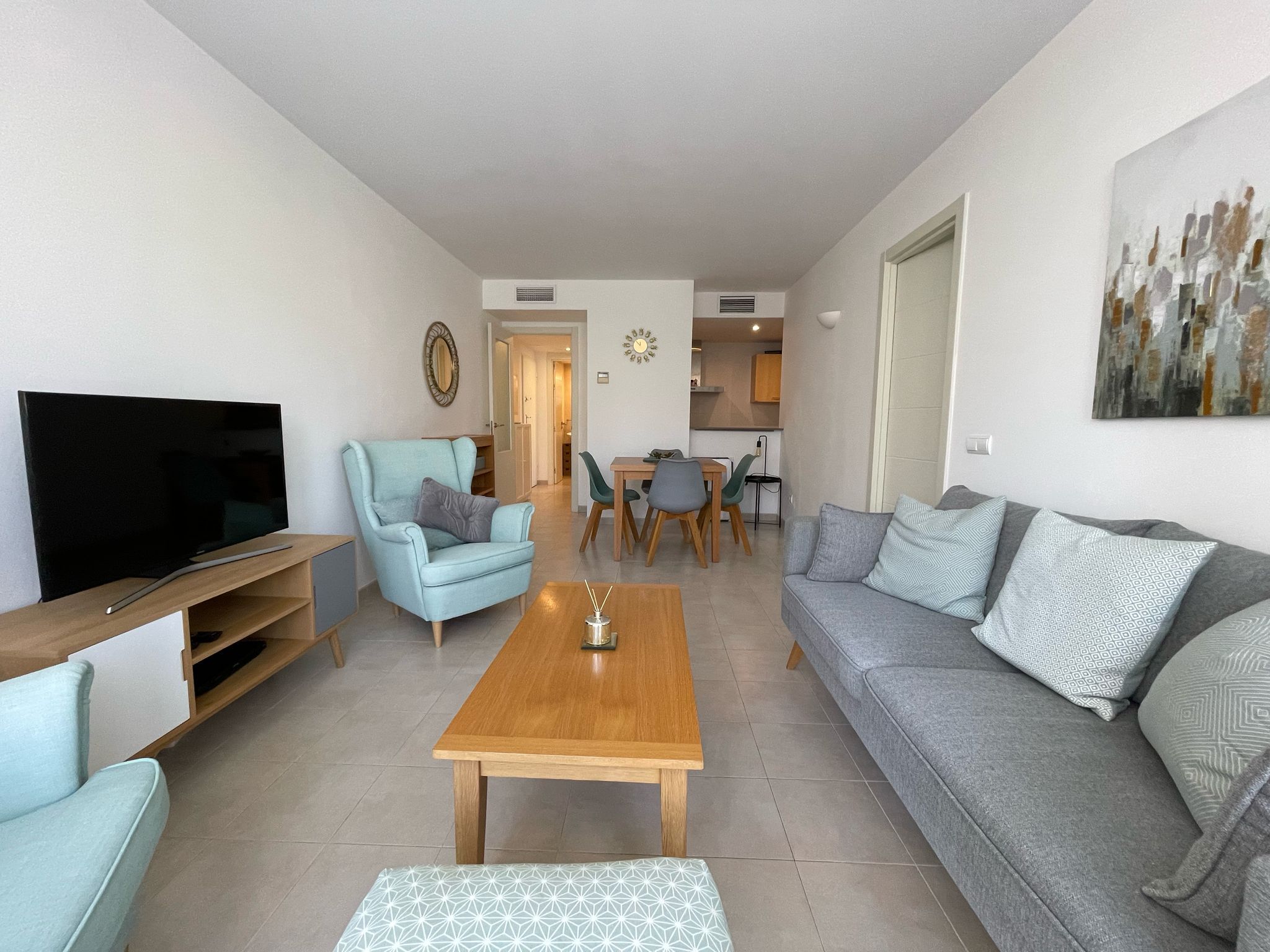 Sala d'estar de Apartament de lloguer en Pollença amb Aire condicionat i Moblat