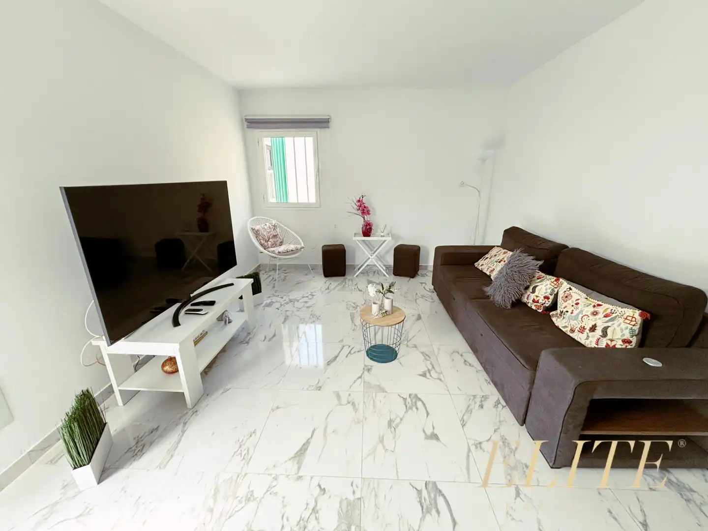 Sala d'estar de Apartament en venda en Mogán amb Aire condicionat, Jardí privat i Terrassa